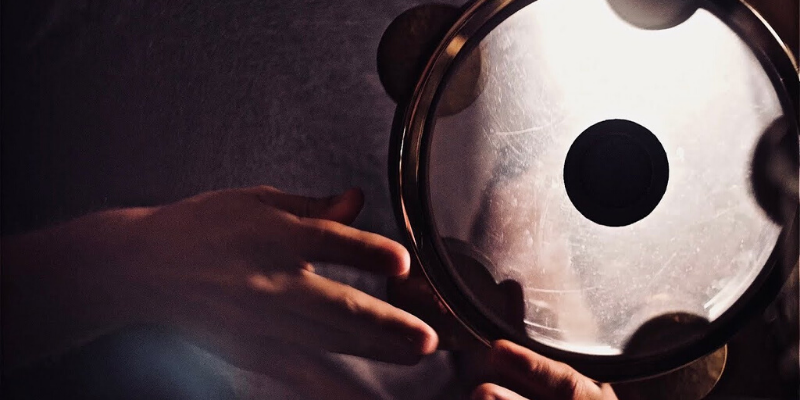 Buying guide for selecting an Arabic riq tambourine with brass jingles